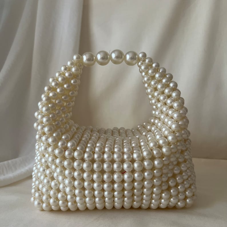 Pearl Oasis Creamy Pearl Bucket Bag by Glorious