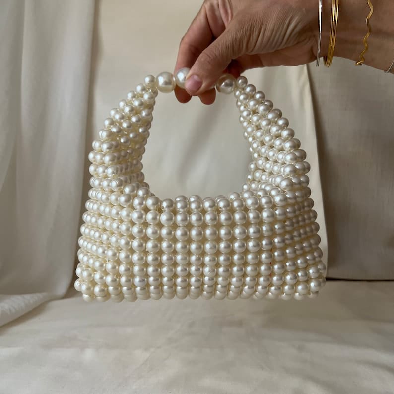 Pearl Oasis Creamy Pearl Bucket Bag by Glorious